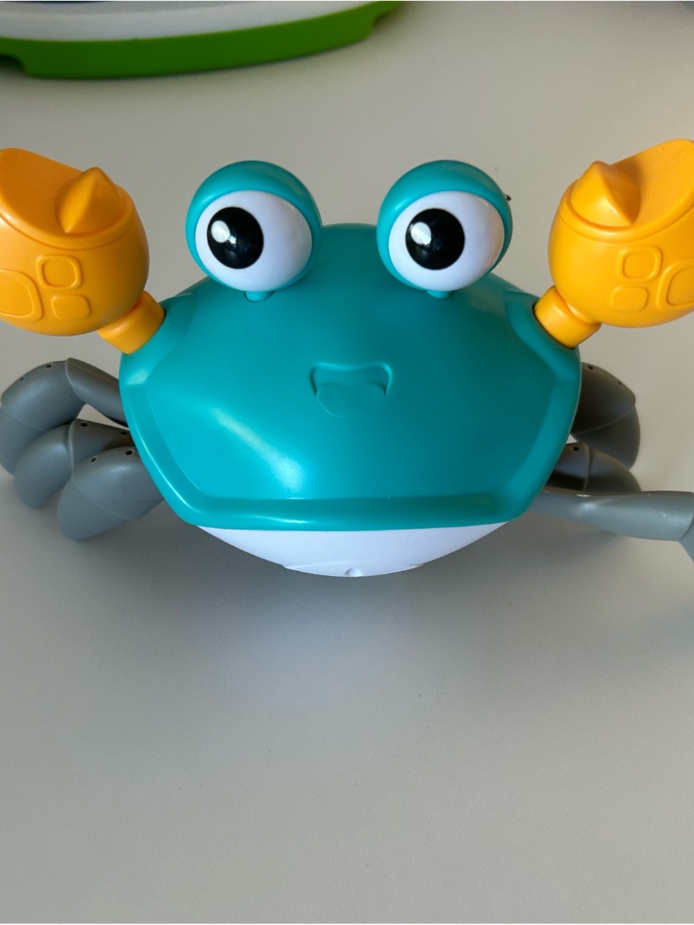 Teal and Yellow crawling Crab baby toy